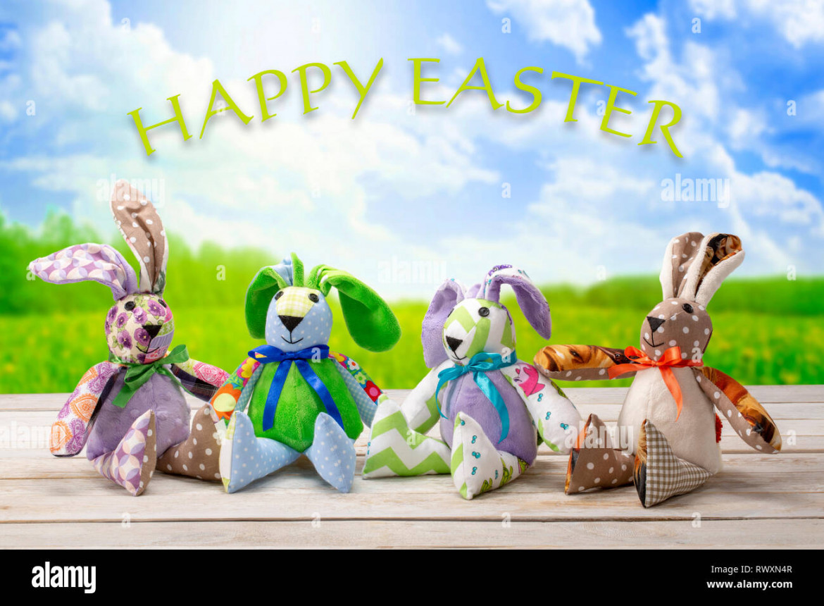 Easter bunnies family with happy easter inscription