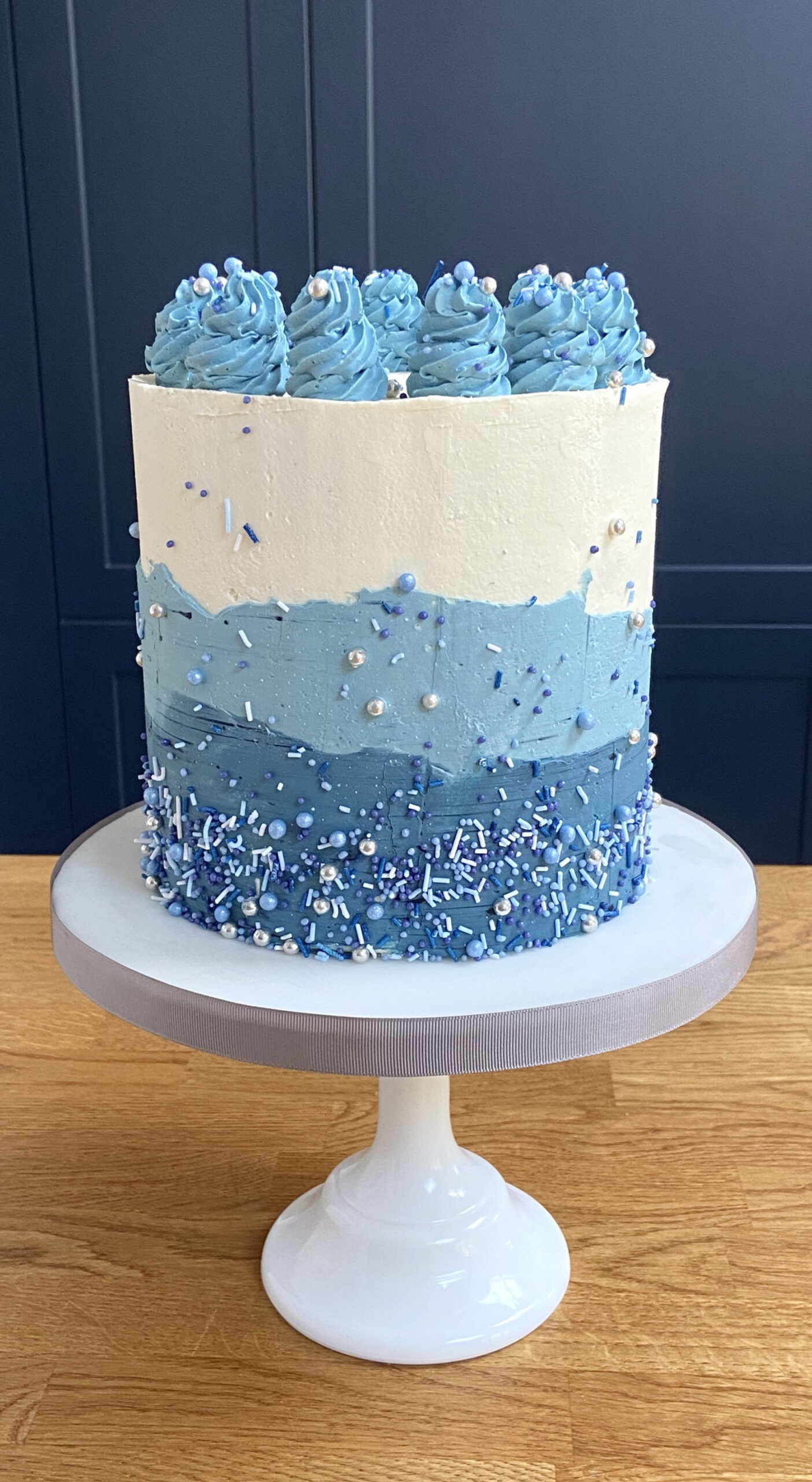 Male blue buttercream birthday celebration sprinkle cake