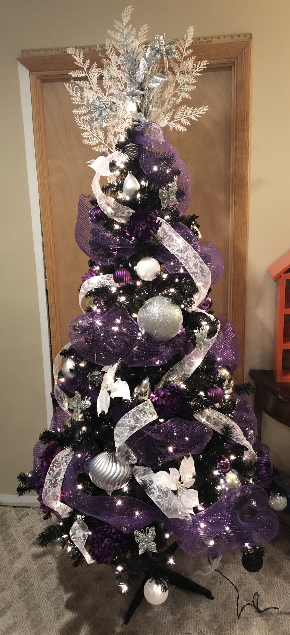 Purple, white silver on a black Christmas tree  Purple christmas