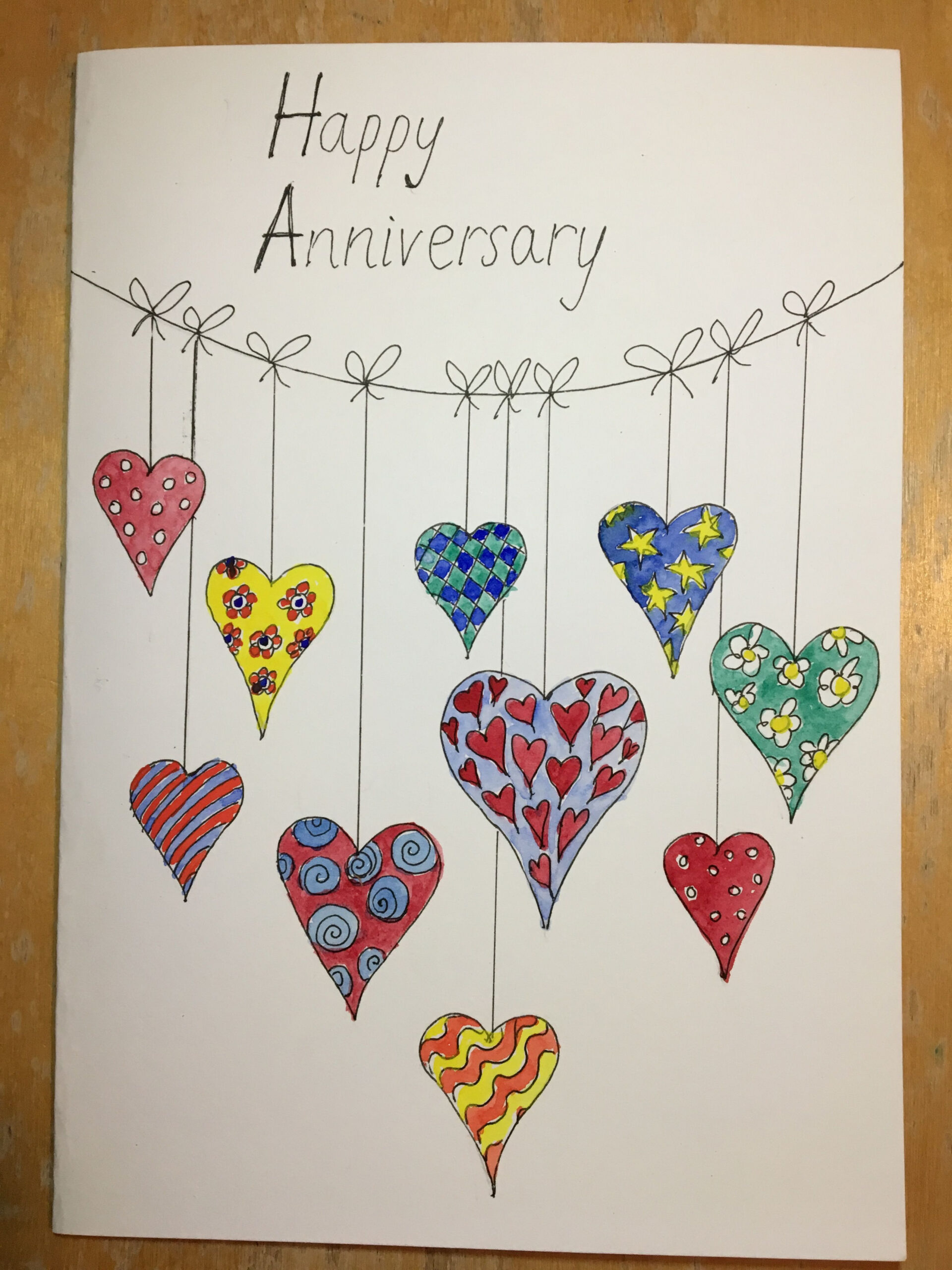 Anniversary card, doodle hearts bunting, watercolour filled line